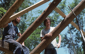 Unidentified (left) and Taber D. Allison (center) in beams at Moon Barn Raising at entrance to Hopkins Forest on 2 August 1975.