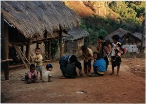 Young boys playing in Southern Thai village
