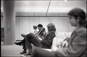 Portrait of people waiting at JFK airport