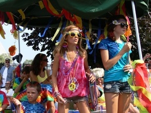 Young parade marchers dressed in bright colors : Provincetown Carnival parade