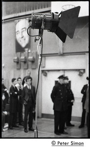 Lighting stanchion, with police in background, awaiting speech by presidential candidate Eugene McCarthy at Boston University