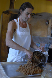 Hungry Ghost Bread: owner and baker Jonathan C. Stevens making filling for cinnamon rolls