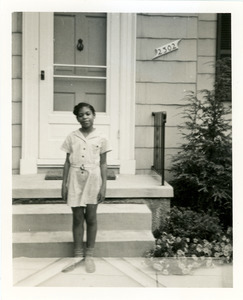 Du Bois Williams in front of Baltimore home