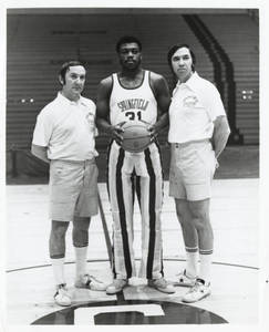 Ed Bilik and Ray Gilbert with basketball player