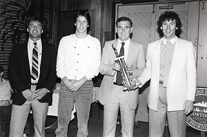 Mayor Raymond L. Flynn presenting the 1984 Ray Flynn Tourney Championship Trophy to members of the West Roxbury Boys and Girls Club