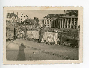 View of rubble and Academy of Music, likely in Germany