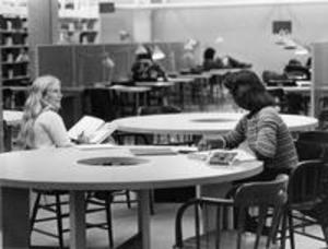 Students studying in Sawyer Library