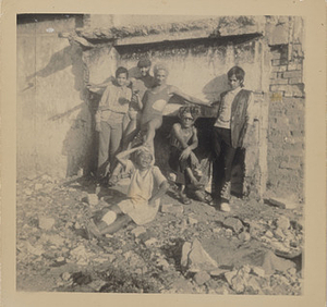 Kewpie, Brigitte, Margaret, and the Seapoint Girls Outside a Demolished Building