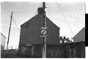 PIRA "Hellibuster"and "Barrack Buster" bombs signs on poles in Crossmaglen, Co. Armagh