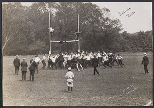 Photo of freshmen "rushing" on to the old athletic field which is now the dustbowl. Freshman rush was a tradition during the early 20th century