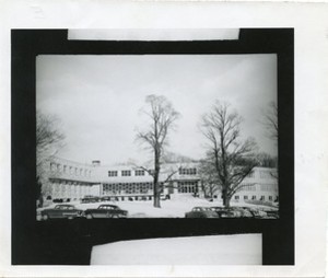 Saint Thomas More Hall exterior with snow in winter