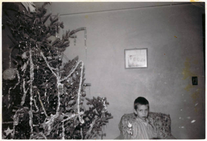 Joe with cowboy gun on Christmas