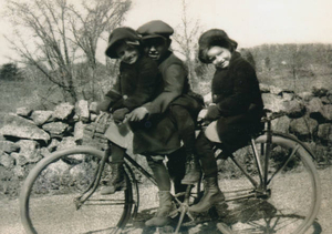 My father and his twin sisters off to school