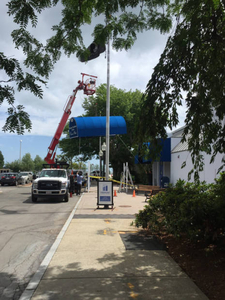 Raising the new/clean Boston Teachers Union (BTU) awning