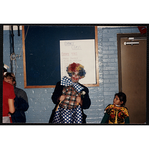 Two children pose in their Halloween costumes