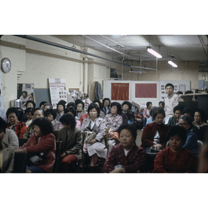 Audience at garment workers meeting