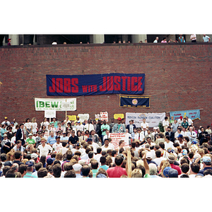 Rainbow Coalition leader Jesse Jackson speaks to a large crowd of striking NYNEX workers at City Hall Plaza, Boston