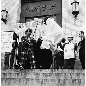 Mayor of Huntington Avenue candidate Paul I. Tishin campaigns in front of the Ell Student Center