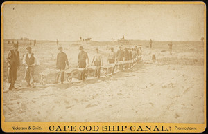 Cape Cod Ship Canal, cabinet card showing a line of workers with shovels and wheelbarrows during the construction of the Cape Cod Canal