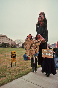 Pentagon demonstrators with the black and red puppets