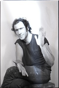 Studio portrait of Richard Safft, seated on a stool