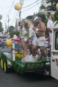 Parade marchers dressed as 1970s-era tennis players : Provincetown Carnival parade