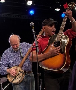 Guy Davis (right) and Pete Seeger performing on stage at the Power of Song Award concert, Symphony Space, New York City