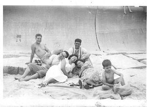 Adalice, Fernando, Antonio, and friends smiling at Lynn Beach