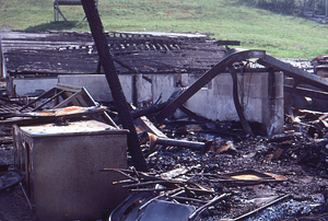 Petersburg Pass - Mt. Raimer Ski Area following 19830509 Roadhouse Fire - Charred remains of roadhouse interior.