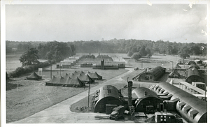 General view of 7th General Hospital at Nocton showing Nissen huts, concrete-floored tents and one-story brick wards
