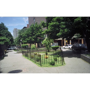 View of the Villa Victoria neighborhood showing part of the park and the neighboring arcade.