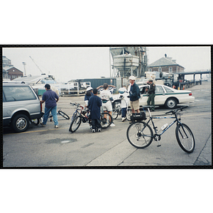 Riders stop on a pier during The Partnership Ride