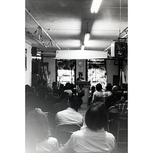 Audience and speaker at the 28th anniversary celebration of the People's Republic of China