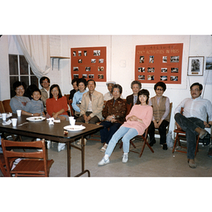 Chinese Progressive Association members sit in a group during their trip to San Francisco
