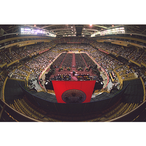 Aerial view of guests and graduates seated at commencement