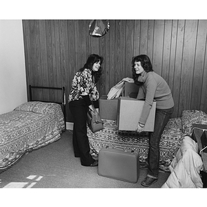 Two female students move into a new dorm