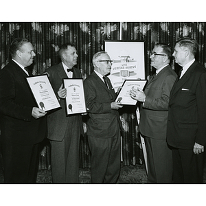 President Knowles presenting new members of the National Council with certificates