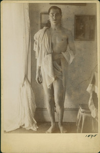 Full-length portrait of a young man, standing, facing front, location unknown,1895