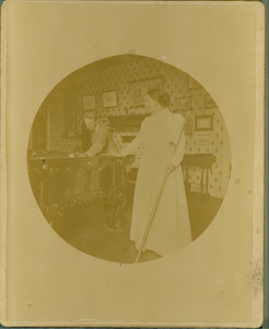 Two unidentified people playing pool, unknown location, undated