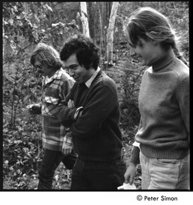 Laurie Dodge, Richard Wizansky, and unidentified woman walking down a dirt road, Tree Frog Farm Commune