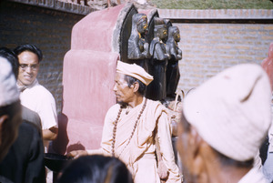 Priest begging near the Gokarna Mahadev temple