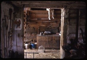 Interior of the barn at Montague Farm Commune, with statue by Susan Mareneck displayed on upper floor