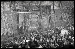 Large crowd gathered to greet the Iran hostages at Highland Falls, N.Y., beneath banner reading 'Welcome home'