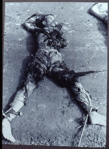 Child lying dead in war