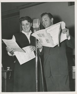 Kay Armand and man singing