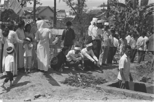Burial of Saigon battle victims in the cemetery behind the home of Ambassador bunker; Saigon.