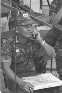 Ranger Colonel Nguyen van Hai radios order to troops during battle in Cholon.