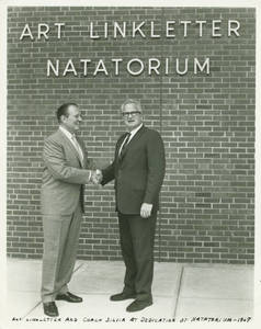 Art Linkletter and Charles Silvia Shaking Hands in front of the Linkletter Natatorium, 1967