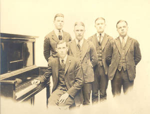 Warren Balentine scrapbook photograph of men at piano