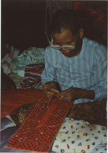 Needlework: Kam Phang continues to working on the Komrope Trie, 1987
